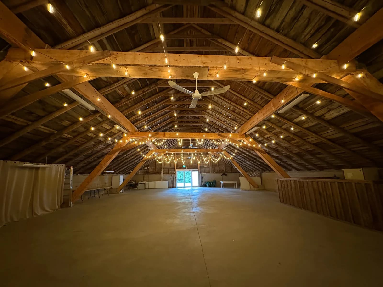 Open barn floor and Edison string lights